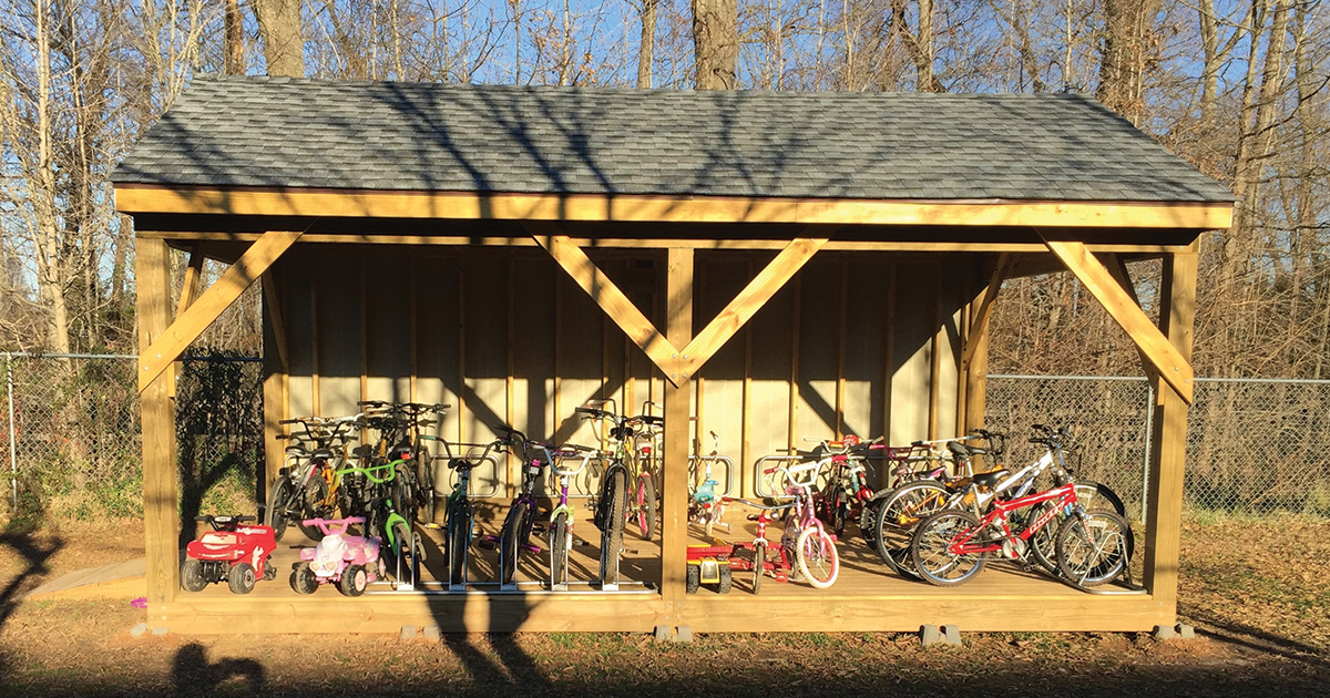 Scout Builds Bicycle Shed for Brisben Center â€