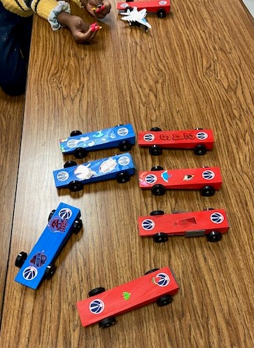 Pinewood Derby Excitement at Scouting Cares – We Own Adventure