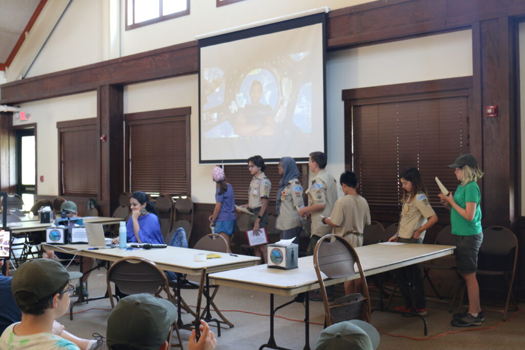 Scouts at Camp William B. Snyder interview astronauts from the Dining Hall